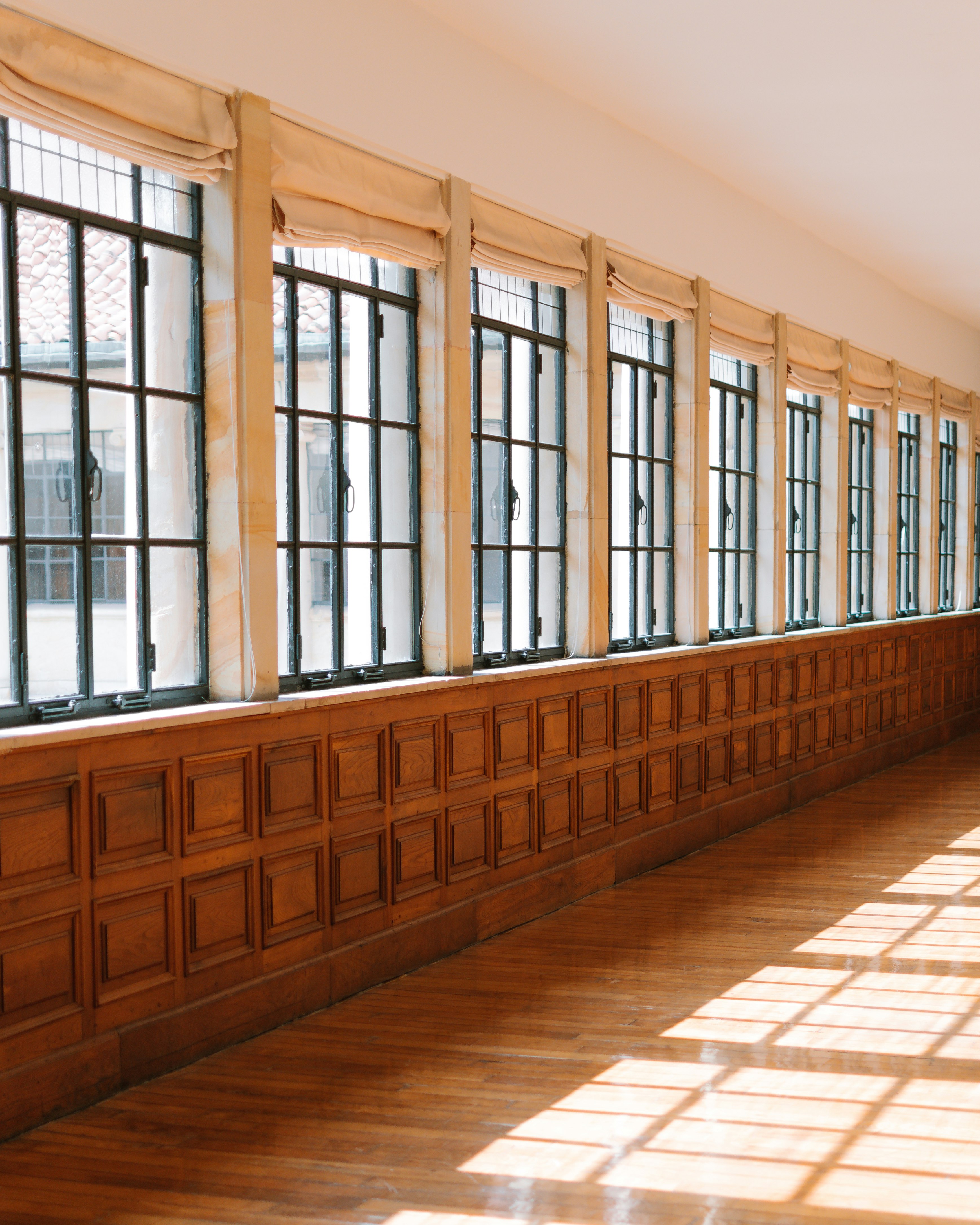 brown wooden framed glass windows